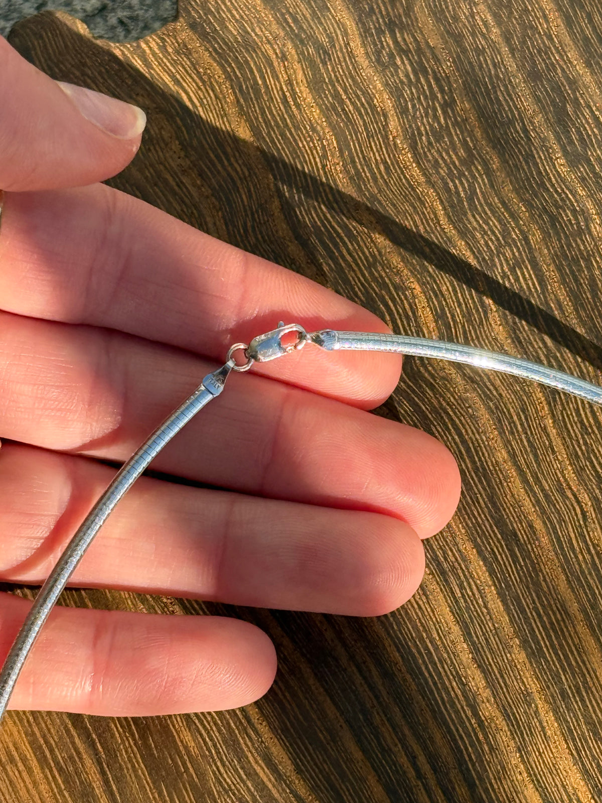 Reversible Omega Chain