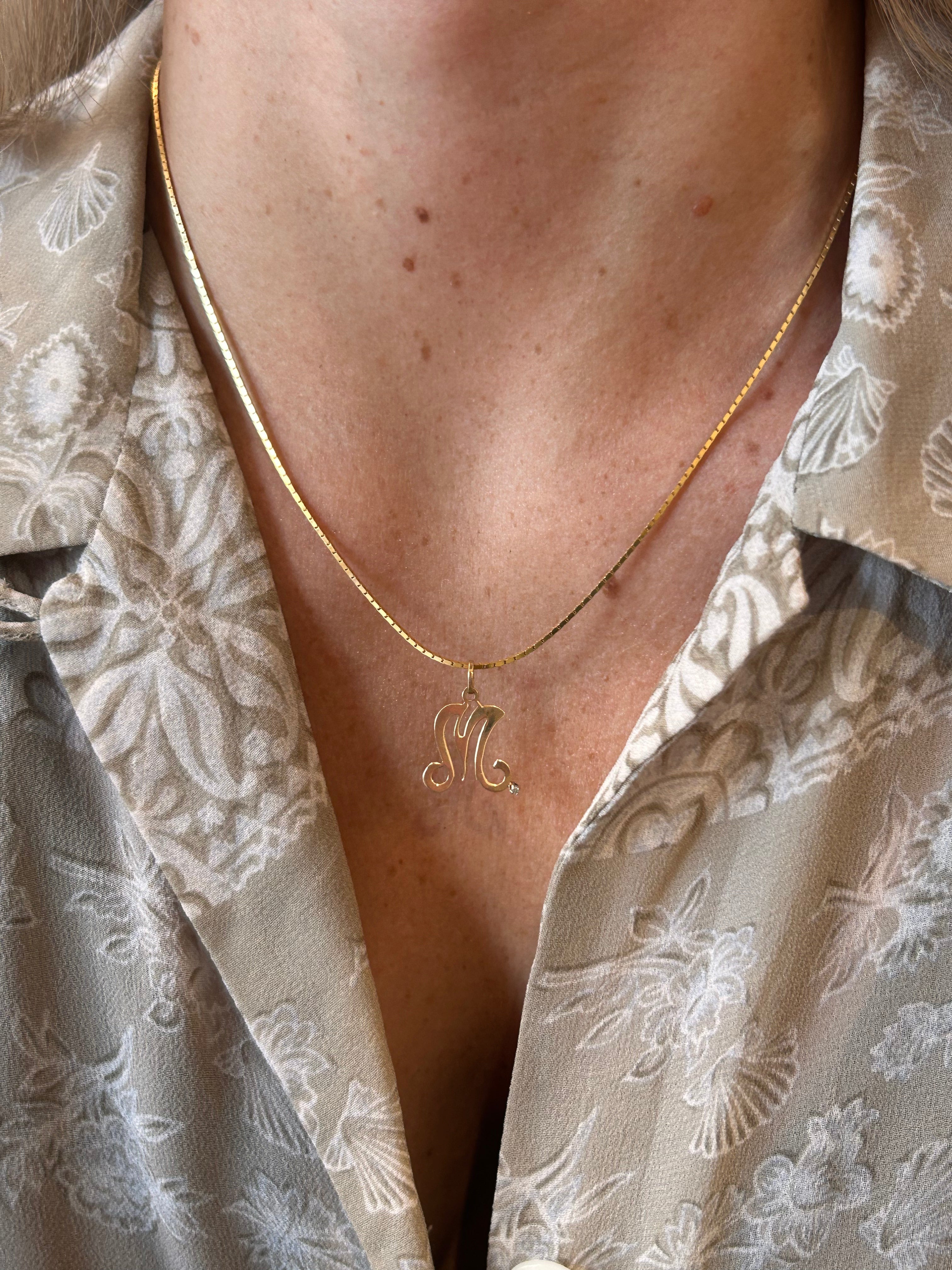 Cursive M charm