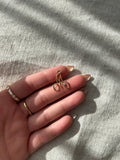 Diamond M charm