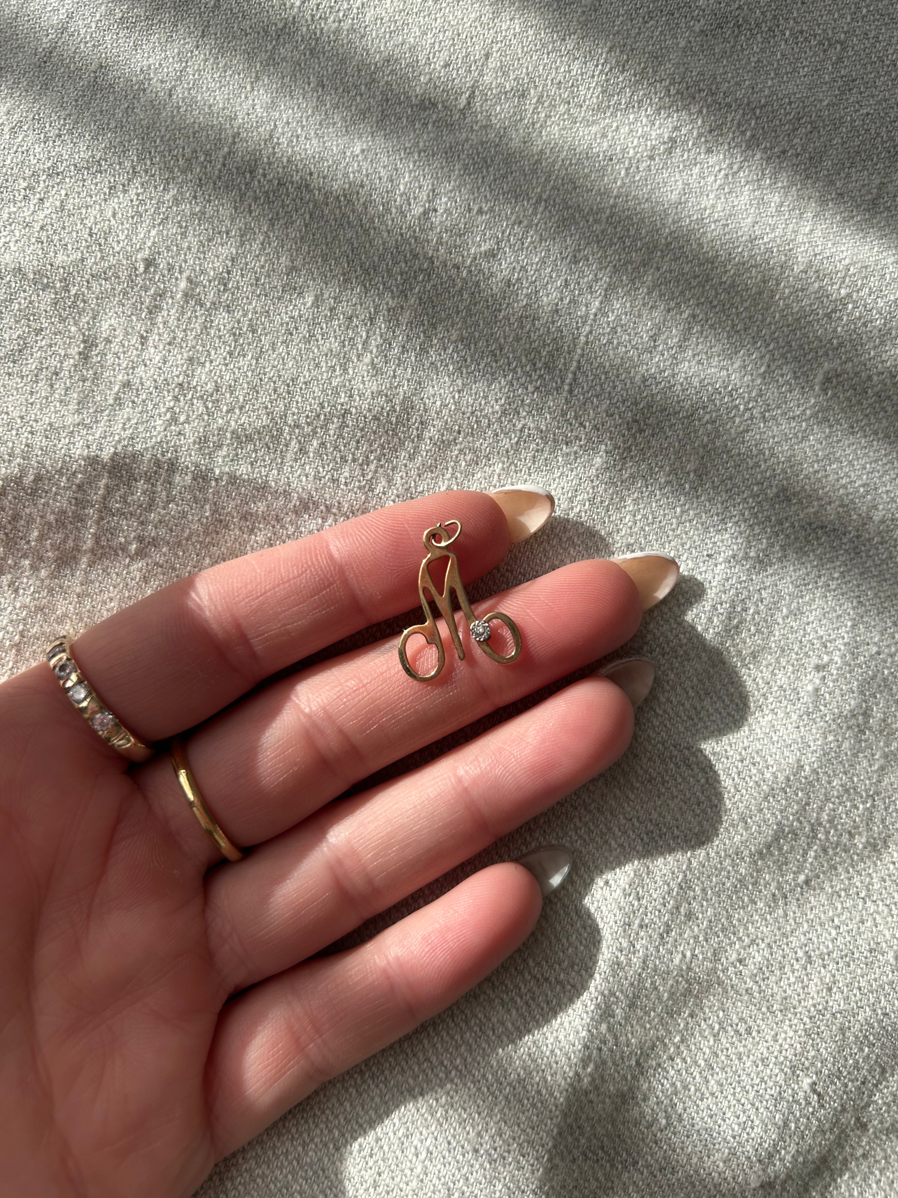 Diamond M charm
