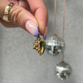 Emerald Conch Charm